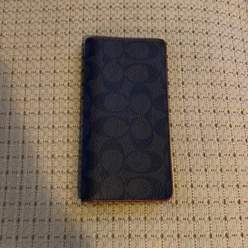 Coach cash wallet holder.